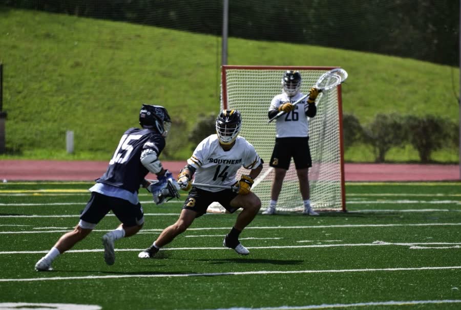 Cade defending in front of the goal