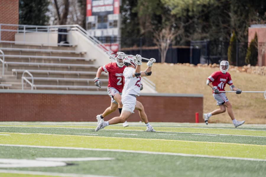 Cade playing lacrosse